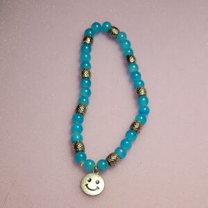 Bright Aqua Blue Glass & Brass Tone Beads On Stretch Cord With Cute Smiley Charm